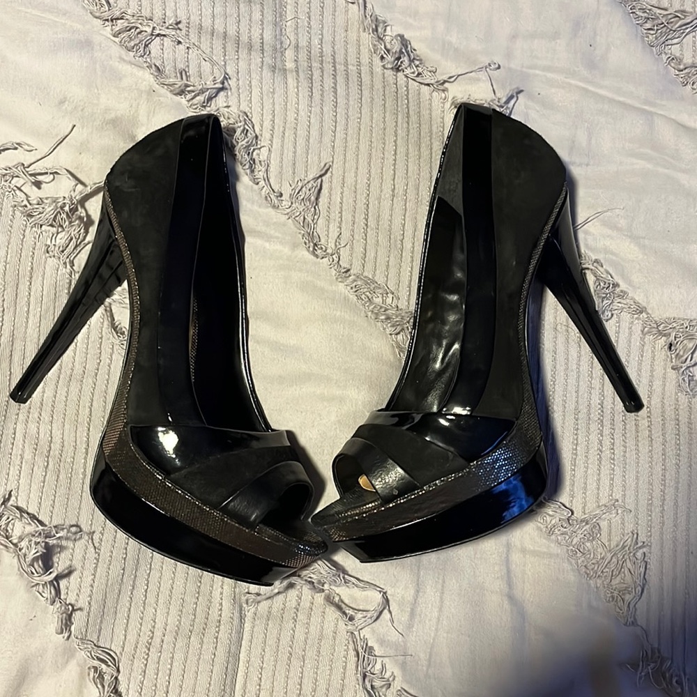 Black and gold peep toe stiletto heels